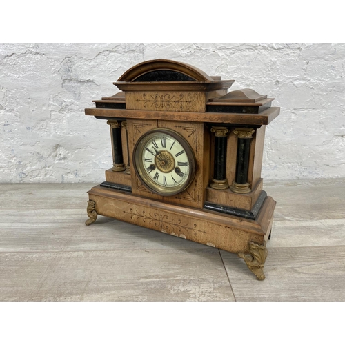 173 - A Victorian walnut cased 14 day strike mantel clock with gilt metal supports, pendulum and key - app... 