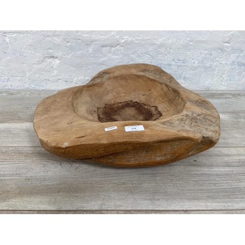 174 - A teak fruit bowl - approx. 54cm x 47cm