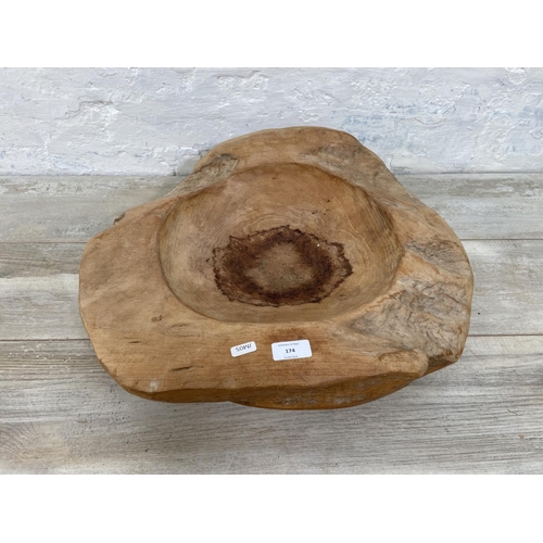 174 - A teak fruit bowl - approx. 54cm x 47cm