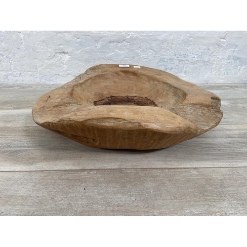 174 - A teak fruit bowl - approx. 54cm x 47cm