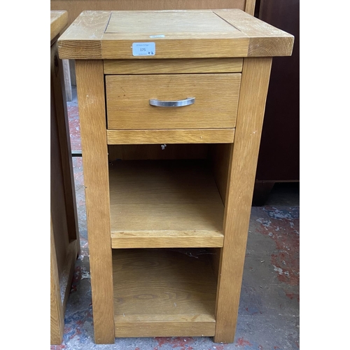 175 - A pair of modern oak side tables - approx. 76cm high x 40cm wide x 40cm deep