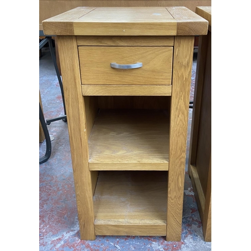 175 - A pair of modern oak side tables - approx. 76cm high x 40cm wide x 40cm deep