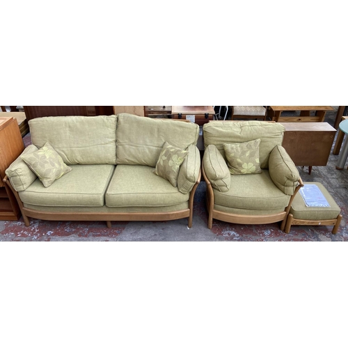 An Ercol Renaissance ash and green fabric upholstered three piece lounge suite comprising 2411/3 three seater sofa, 2411 Easy chair and 1154 square footstool - RRP. £3,500