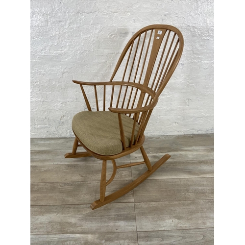 179 - An Ercol blonde elm and beech Chairmakers rocking chair - approx. 105cm high x 59cm wide x 77cm deep