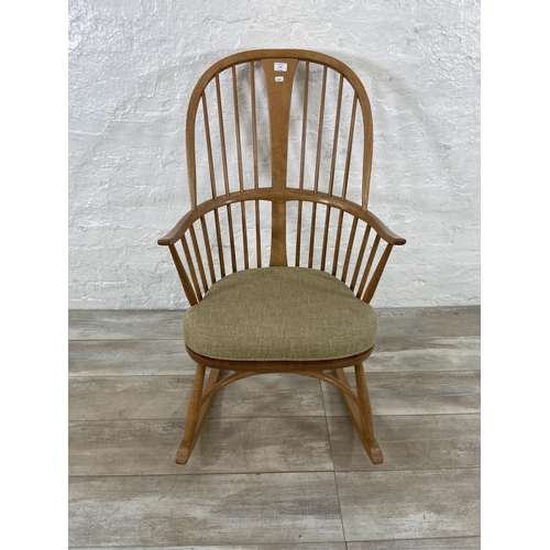 179 - An Ercol blonde elm and beech Chairmakers rocking chair - approx. 105cm high x 59cm wide x 77cm deep