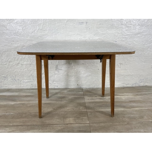 181 - A mid 20th century melamine and beech drop leaf dining table - approx. 75cm high x 91cm wide x 80cm ... 