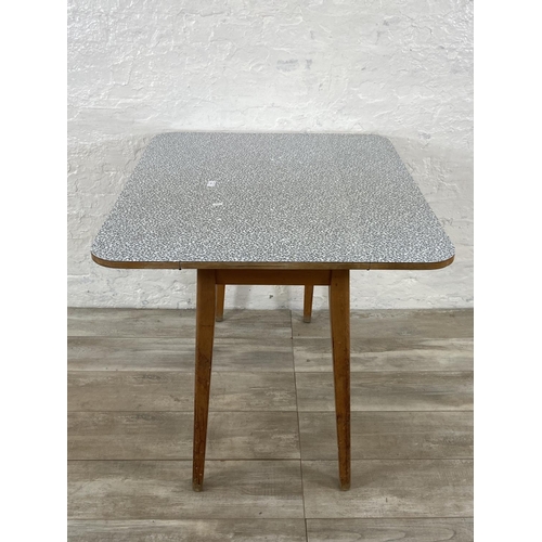 181 - A mid 20th century melamine and beech drop leaf dining table - approx. 75cm high x 91cm wide x 80cm ... 