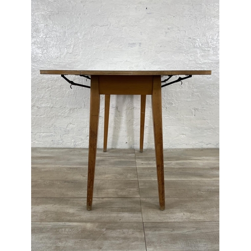 181 - A mid 20th century melamine and beech drop leaf dining table - approx. 75cm high x 91cm wide x 80cm ... 