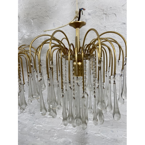 187 - A pair of Murano brass and glass teardrop chandeliers