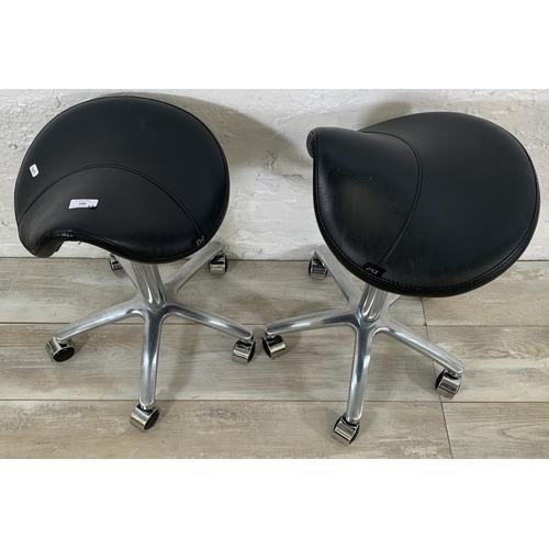 188 - A pair of Dir black leatherette and chrome plated saddle stools