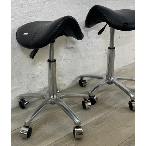 188 - A pair of Dir black leatherette and chrome plated saddle stools