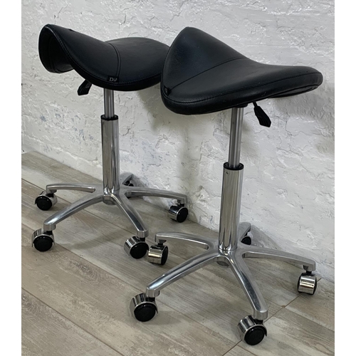 188 - A pair of Dir black leatherette and chrome plated saddle stools