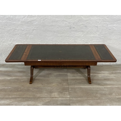 193 - A 19th century style mahogany and green leather drop leaf coffee table