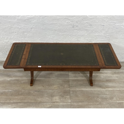 193 - A 19th century style mahogany and green leather drop leaf coffee table