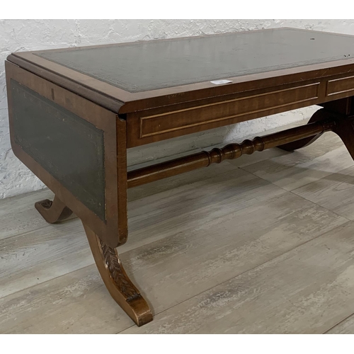 193 - A 19th century style mahogany and green leather drop leaf coffee table