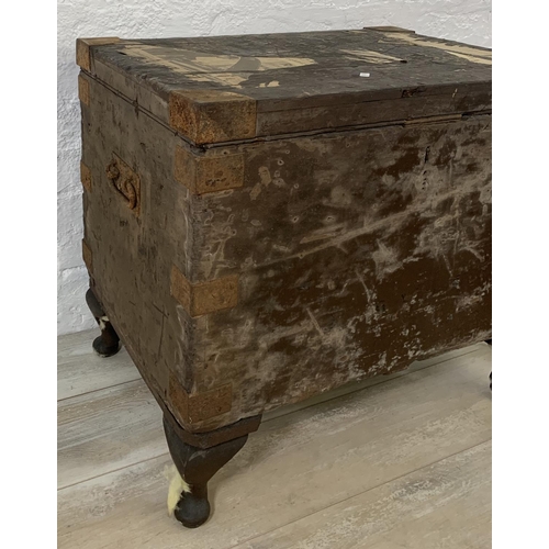 195 - Two early 20th century items, one metal travel trunk and one ebonised pine toolbox