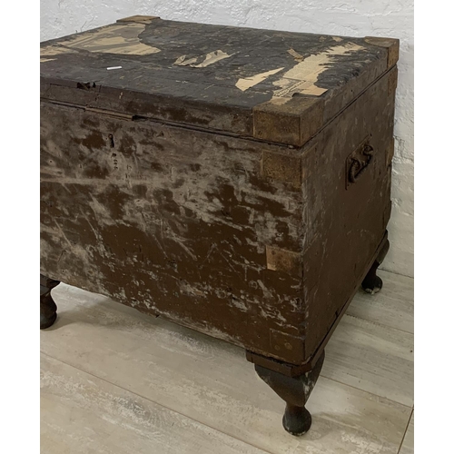 195 - Two early 20th century items, one metal travel trunk and one ebonised pine toolbox