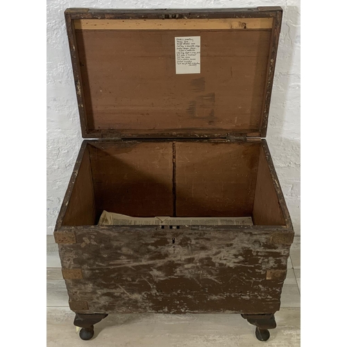 195 - Two early 20th century items, one metal travel trunk and one ebonised pine toolbox