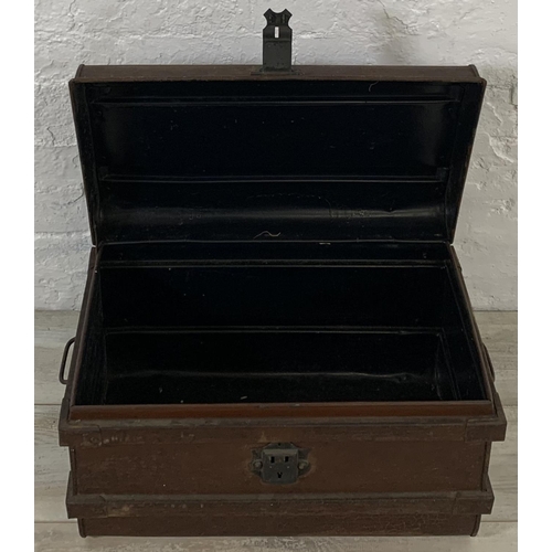 195 - Two early 20th century items, one metal travel trunk and one ebonised pine toolbox