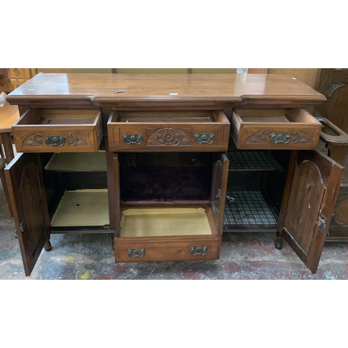 197 - A Victorian carved mahogany sideboard - approx. 98cm high x 153cm wide x 51cm deep