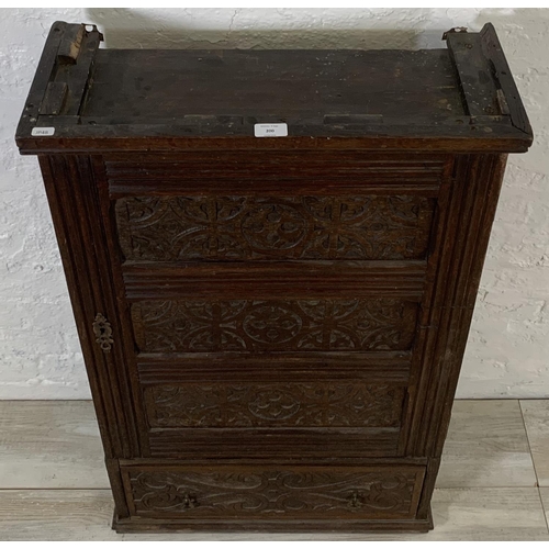 200 - A 19th century carved oak wall mountable cabinet - approx. 97cm high x 60cm wide x 24cm deep