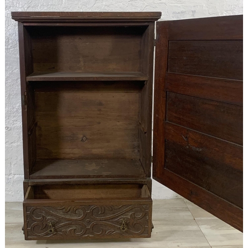 200 - A 19th century carved oak wall mountable cabinet - approx. 97cm high x 60cm wide x 24cm deep