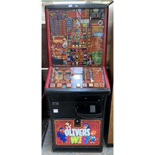 207 - A Betcom 'Oliver's Twist' electric coin operated fruit machine - approx. 178cm high x 72cm wide x 66... 