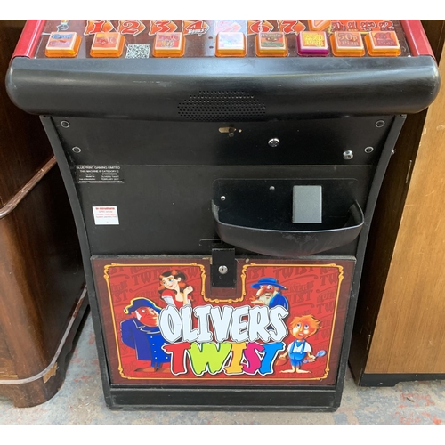 207 - A Betcom 'Oliver's Twist' electric coin operated fruit machine - approx. 178cm high x 72cm wide x 66... 