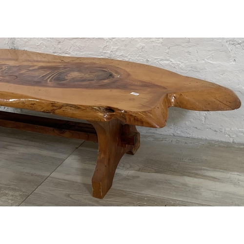 210 - An yew wood live edge tree slice coffee table - approx. 35cm high x 54cm wide x 134cm long