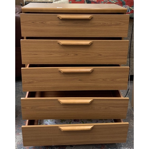 224 - A teak effect chest of drawers - approx. 105cm high x 77cm wide x 42cm deep