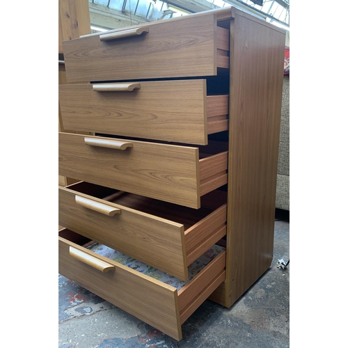 224 - A teak effect chest of drawers - approx. 105cm high x 77cm wide x 42cm deep