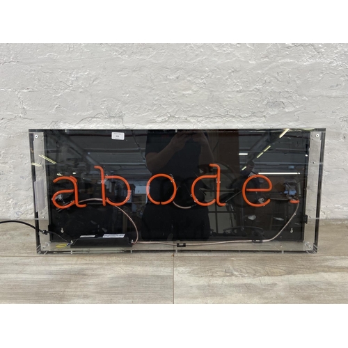 225 - A Neon Creations Ltd. 'Abode' wall mountable illuminating sign - approx. 40cm high x 90cm wide x 9cm... 