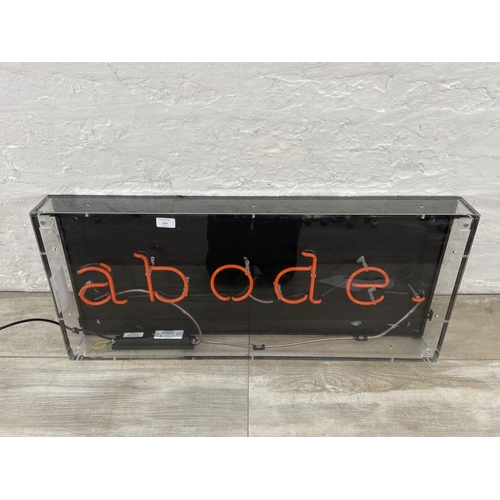 225 - A Neon Creations Ltd. 'Abode' wall mountable illuminating sign - approx. 40cm high x 90cm wide x 9cm... 