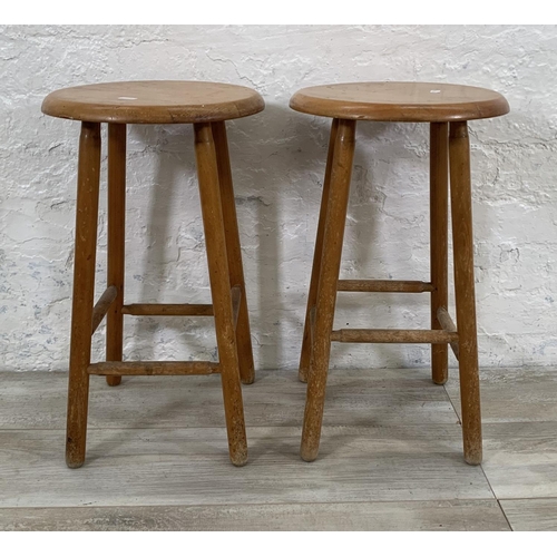 230 - Five pieces of furniture, two beech circular top stools, one pine side table, one wicker stool and o... 