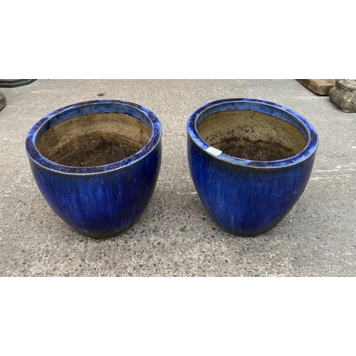 231E - A pair of blue glazed circular garden planters - approx. 33cm high x 38cm diameter