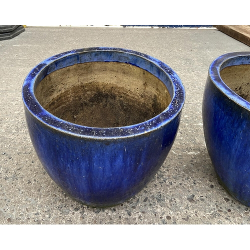 231E - A pair of blue glazed circular garden planters - approx. 33cm high x 38cm diameter