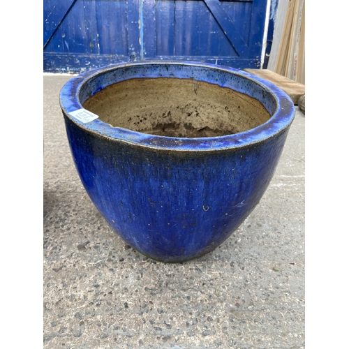 231E - A pair of blue glazed circular garden planters - approx. 33cm high x 38cm diameter