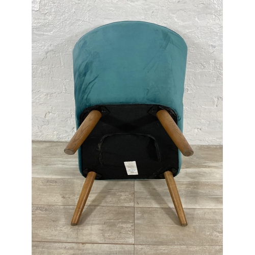 239 - A Dunelm green fabric upholstered occasional chair on oak supports