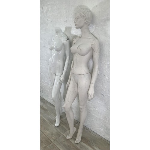 233 - Two white fibreglass nude female mannequins - largest approx. 184cm high