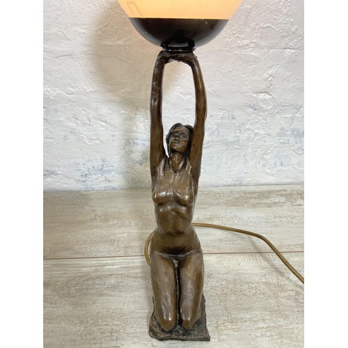 25 - An Art Deco style bronzed nude lady table lamp - approx. 46cm high