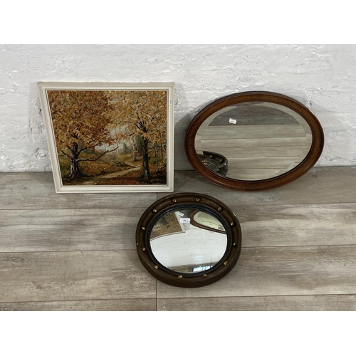 256 - Three framed items, one M. Newell oil on board of a woodland scene, one early 20th century oak frame... 