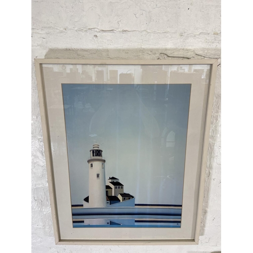 271 - Two framed B. J. lighthouse scene prints, one titled 'One Of These Mornings' and one titled 'Calm Da... 