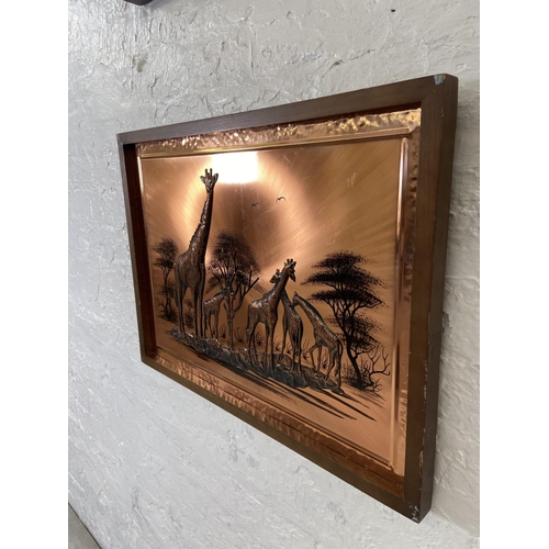 281 - Two framed copper relief 3D wall plaques, one of elephants and one of giraffes - largest approx. 60c... 