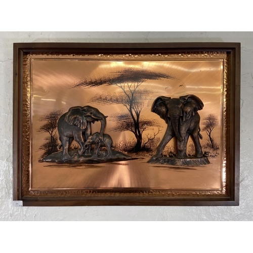 281 - Two framed copper relief 3D wall plaques, one of elephants and one of giraffes - largest approx. 60c... 