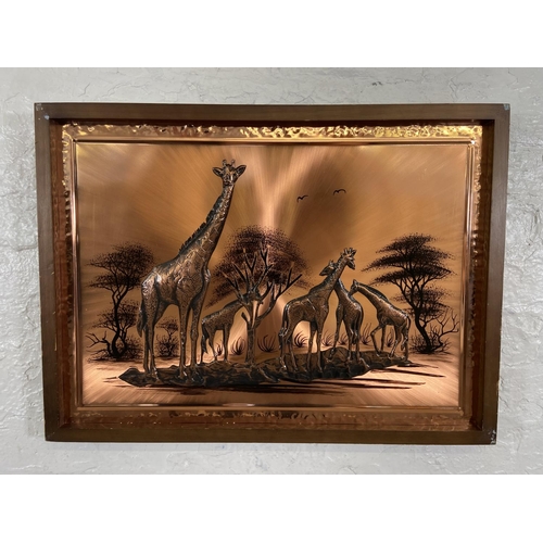 281 - Two framed copper relief 3D wall plaques, one of elephants and one of giraffes - largest approx. 60c... 