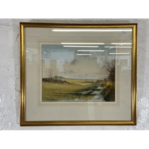 284 - Two gilt framed Ken J. Messer (1931-2018) watercolours of landscapes - largest approx. 58cm high x 6... 