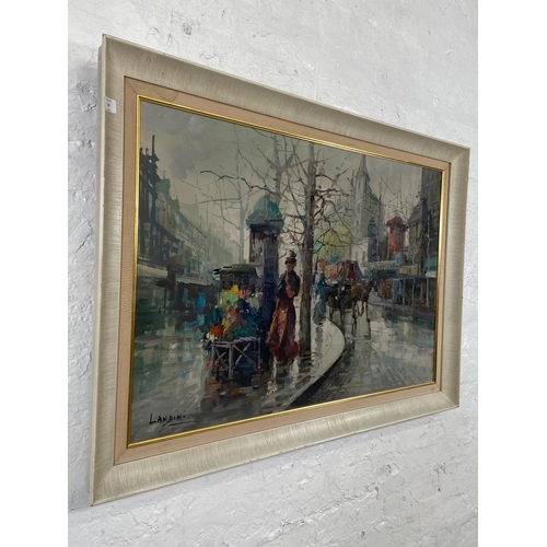 287 - A mid 20th century framed Landini oil on canvas of a street scene - approx. 75cm high x 106cm wide