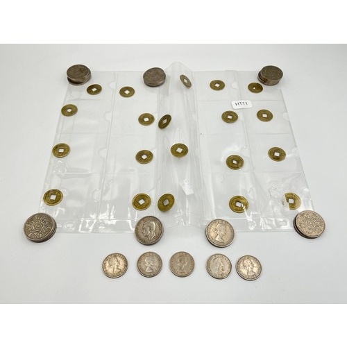 2210 - A collection of coins, one album page containing twenty Chinese fractional cash - each approx. 20mm ... 