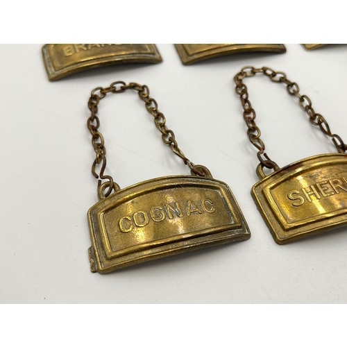 2213 - Six vintage brass decanter labels