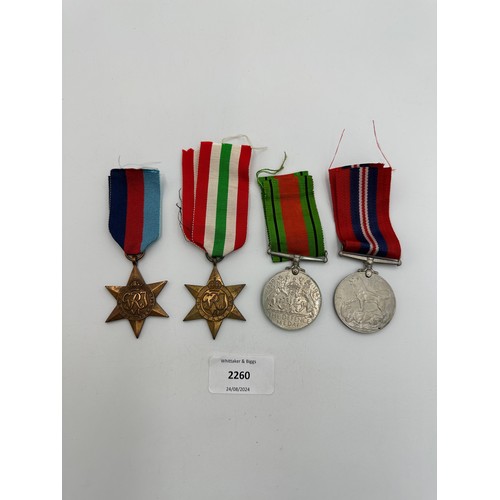 2260 - Four WWII medals, War, The Defence, The Italy Star and the 1939-1945 Star